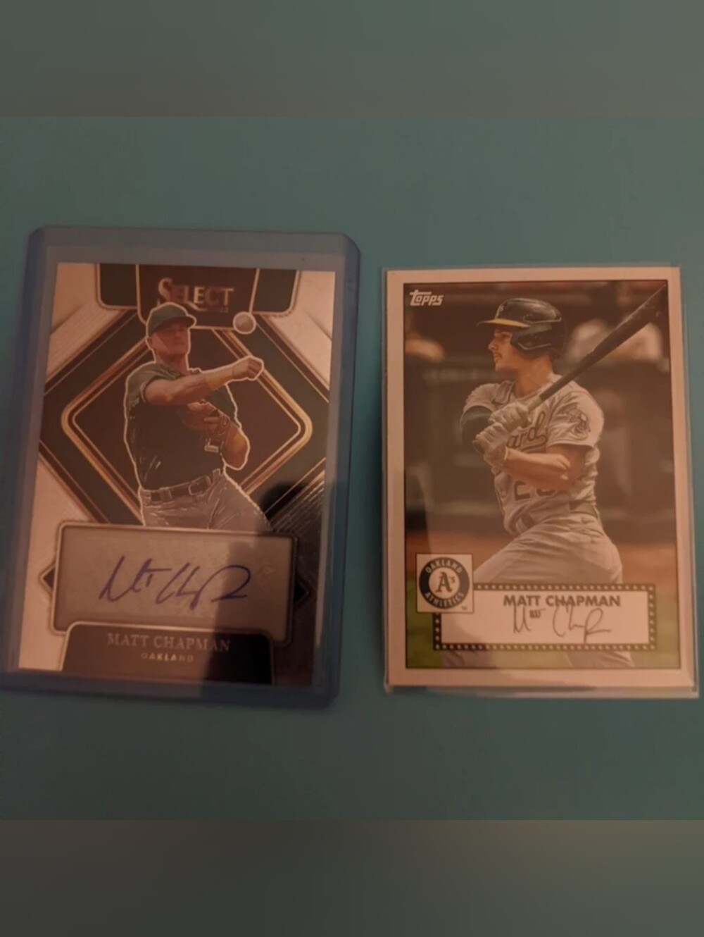 Autographed Matt Chapman cards. 2021 Topps series one, 2022 Panini